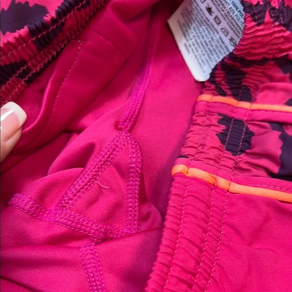 Girls Pink and Purple Athletic Shorts with Orange Trim